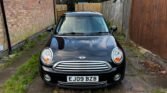 This 2009 Mini Hatchback 1.4 One 3dr is a stunning black 3 door hatchback with a manual transmission. It has been driven for 75000 miles