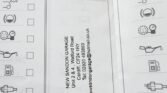 A vehicle service record booklet open to a page with various icons and checkboxes. Two entries are visible: the first for a 2011 Mini One, date "8/3/24" and distance "21,0923"; the second entry has the date "21/09/23" and distance "21,0923". Below is contact info for New Sandon Garage, Cardiff.