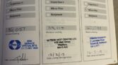 A MINI car service booklet displays three maintenance records with mileage readings of 36,057, 39,114, and 40,038. Each record is stamped and signed by different service centers, detailing completed services like oil service and inspections.