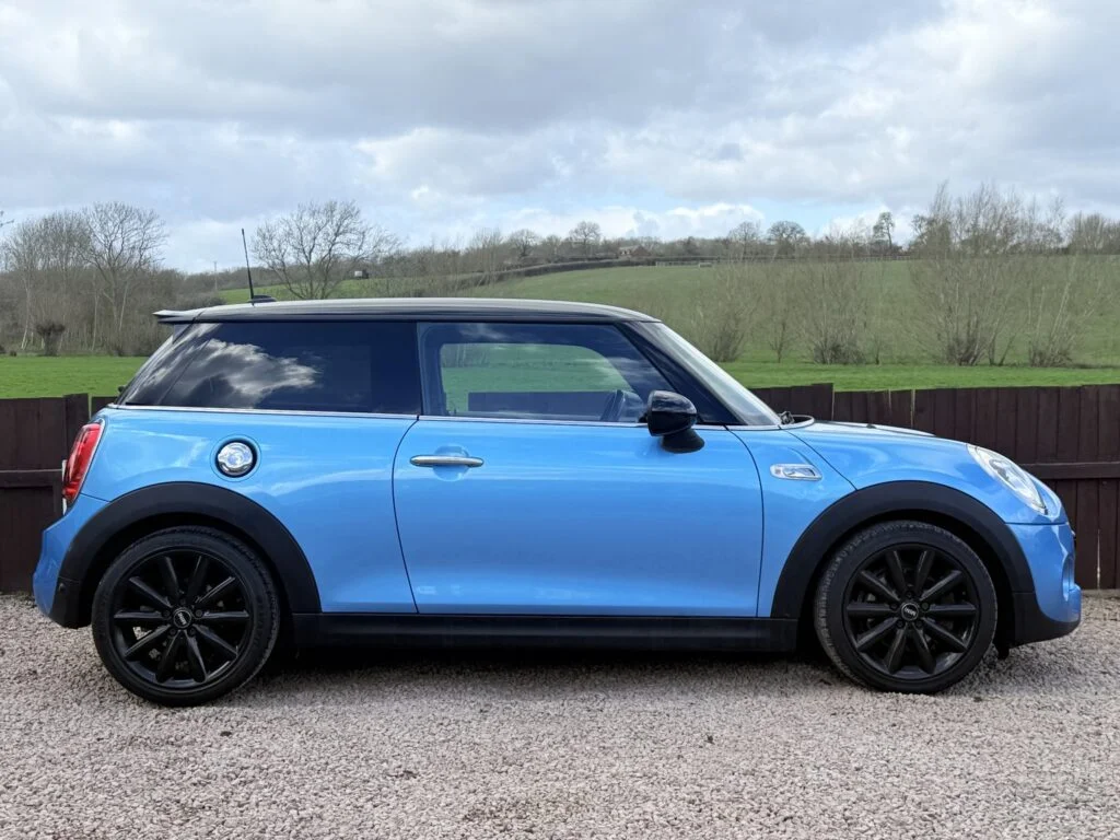 What model is my MINI: a Cooper S hatchback showing the badges and grille that identify it