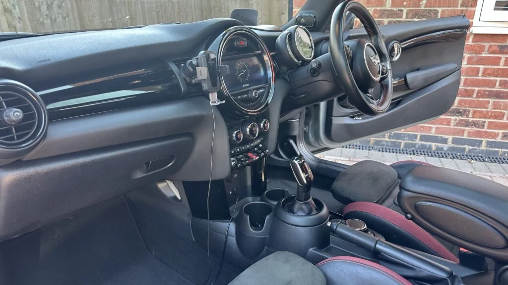 The automatic gear selector and interior of a MINI Cooper, part of the MINI Cooper manual vs automatic comparison